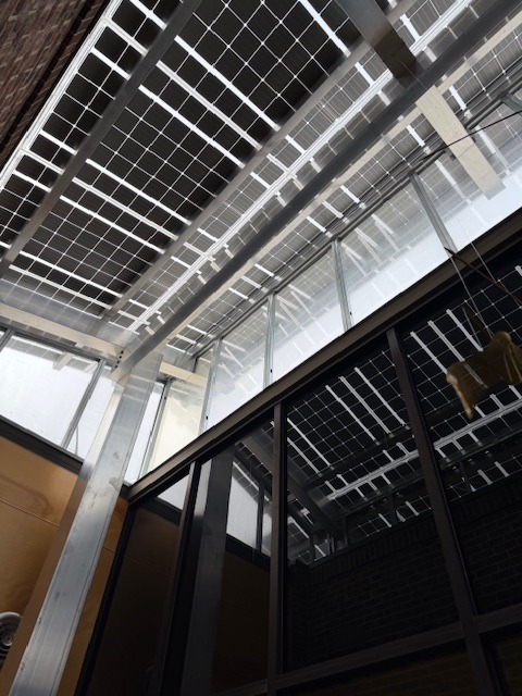 Solar canopy panels seen from below at Soleri